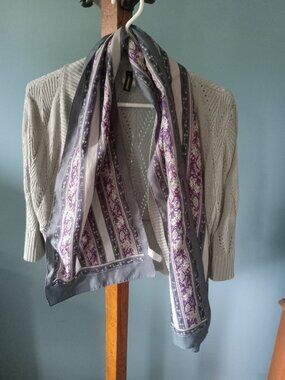 Ladies laser cut grey mid sleeve cardigan with purple paisley polyester scarf
